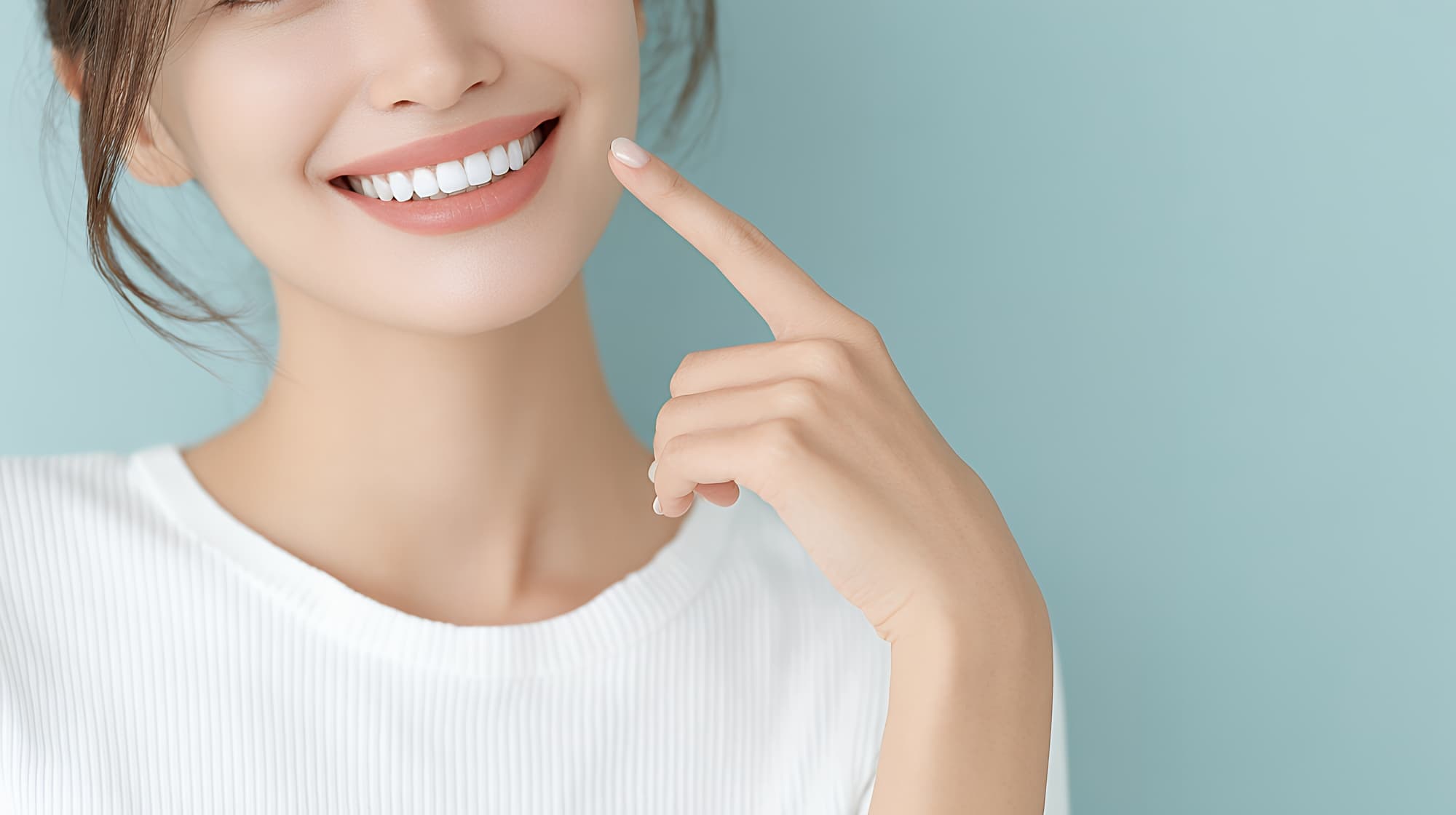 銀歯を白い歯に治療し笑顔に自信が出た女性