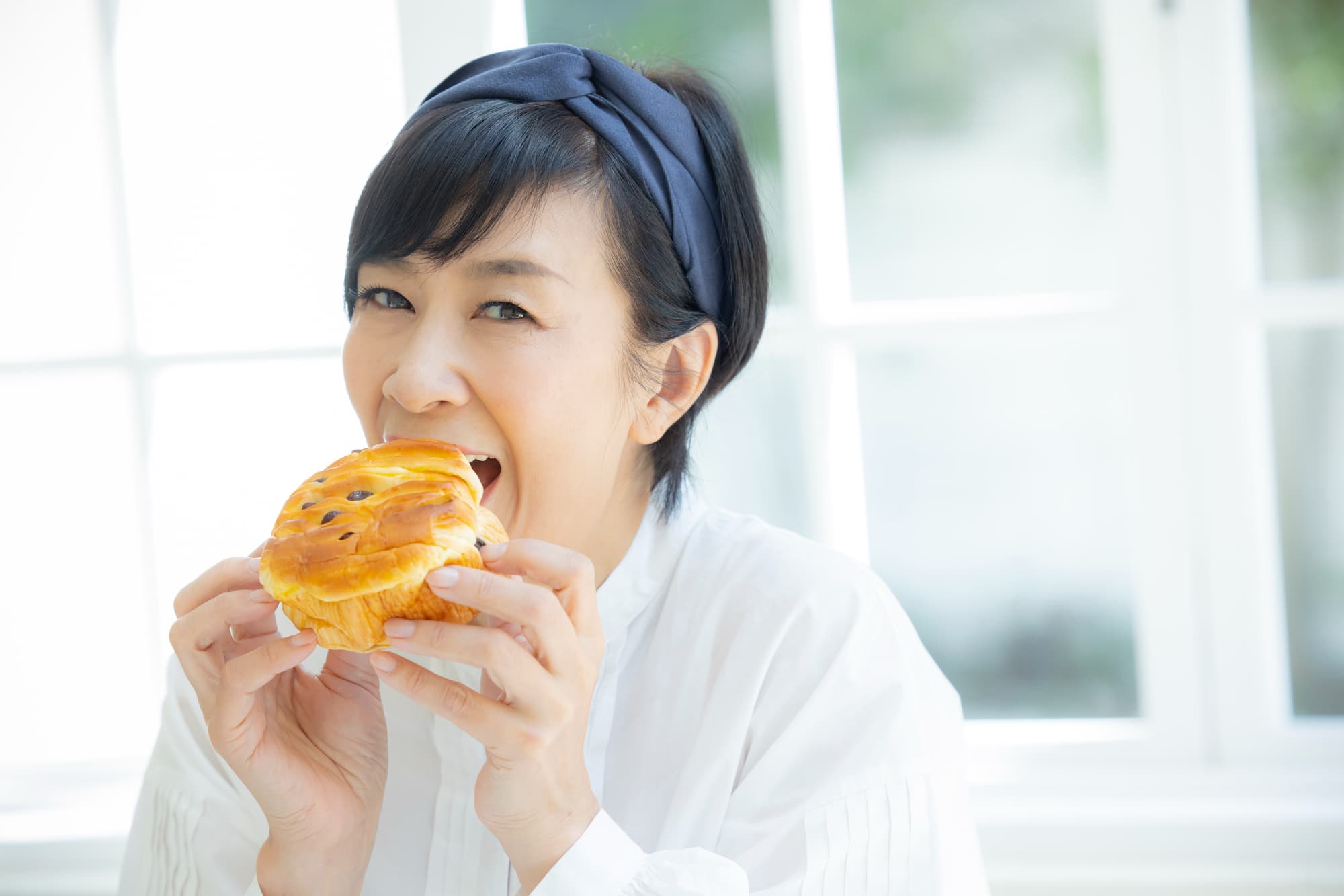 顎の痛みが改善し口を開けられるようになった女性